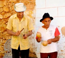 Musicians play in the streets of Cuba